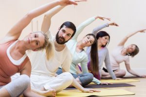 group-people-performing-stretching-exercise.jpg